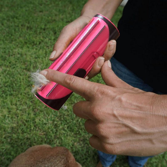 Person using a pink hair removal device on grass