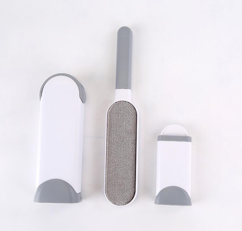 Set of three grooming tools with gray and white design