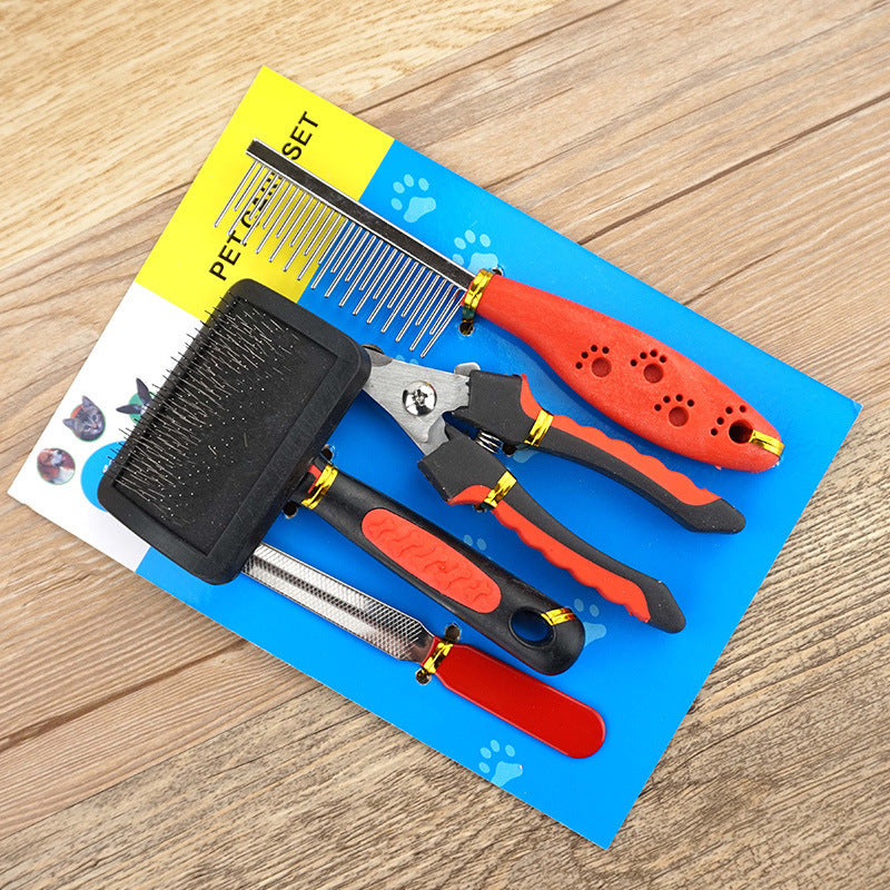 Pet grooming tools set on a blue and yellow mat with paw prints