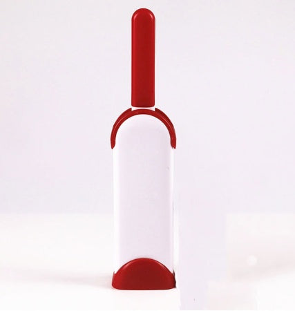 Red and white pet grooming tool