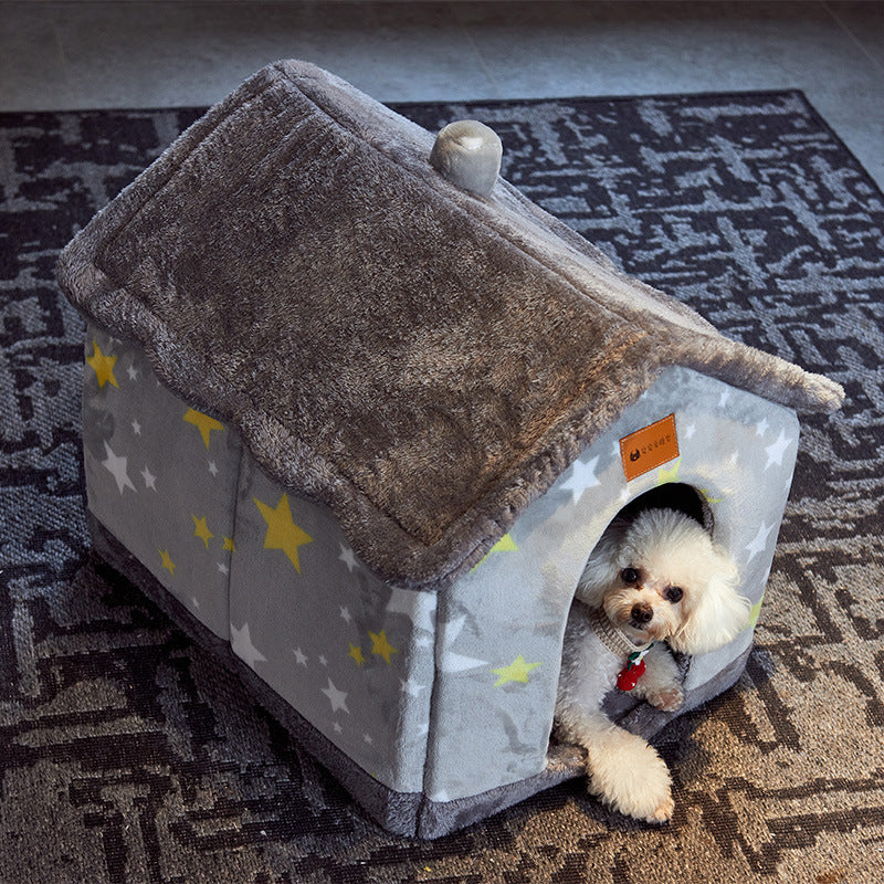 Dog peeking out from a gray pet house with star patterns