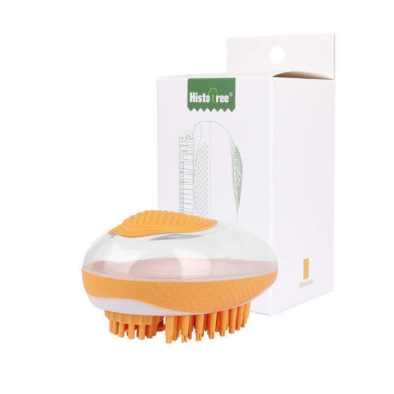 Orange and white grooming brush with packaging