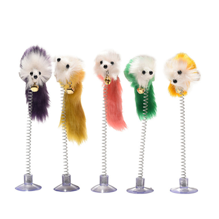 Five colorful cat toys with spring mechanisms on a white background
