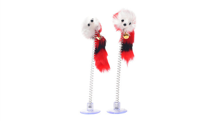 Two plush toys on springs with red and black accents on a white background