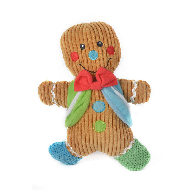 Toy gingerbread man with colorful decorations on a white background