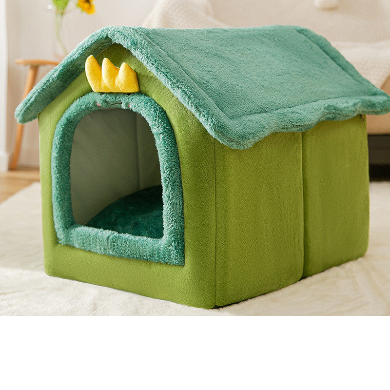 Green pet house with a yellow roof