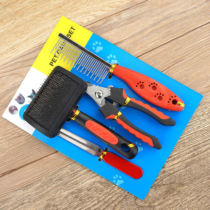 Pet grooming tools set on a blue and yellow mat with paw prints