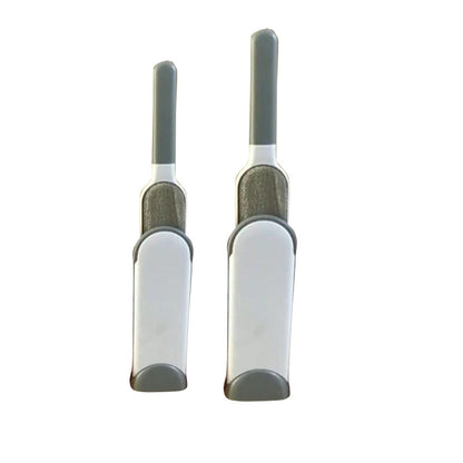 Two white and gray grooming tools