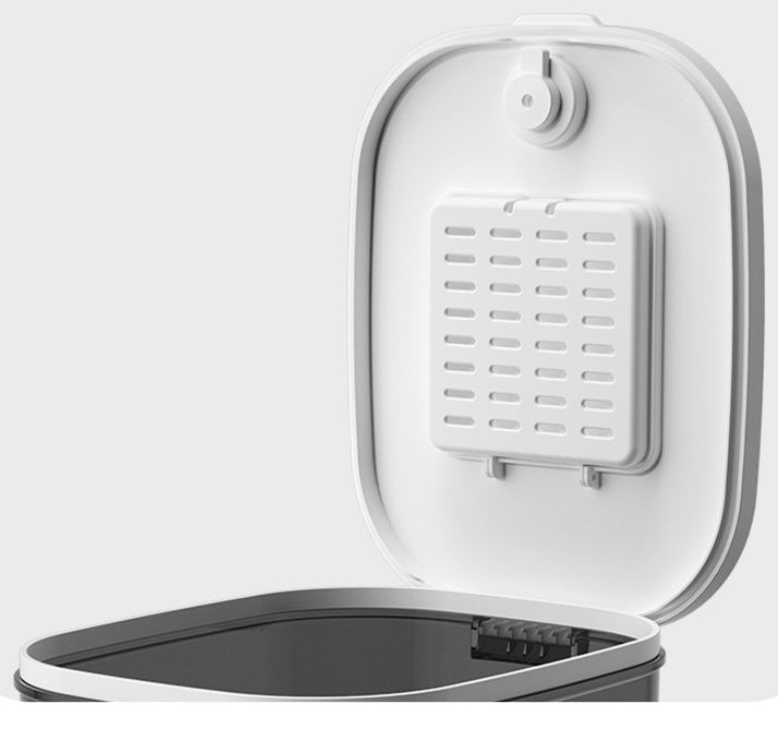 White electronic device with a black base on a white background