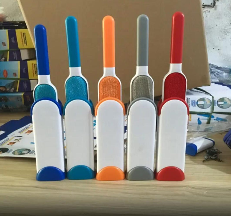 Set of colorful pet grooming brushes