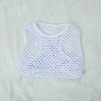 White mesh top on a light beige background