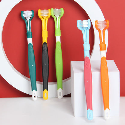 Set of colorful toothbrushes on a white stand with a red background