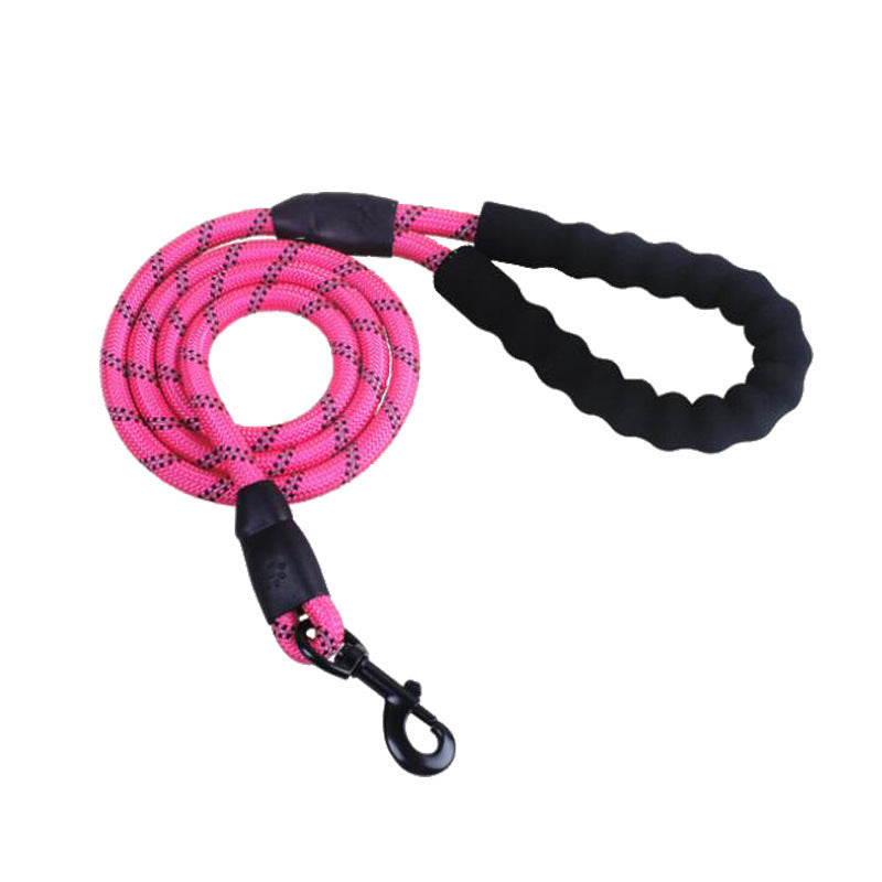 Pink and black dog leash on a white background